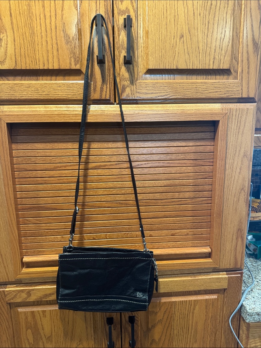 The Sak Black Women’s Crossbody Bag - Classic Leather Shoulder Purse